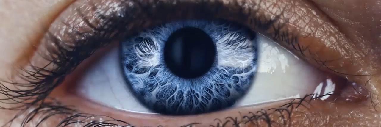 A Zeiss stock image of a close up of a blue eye.